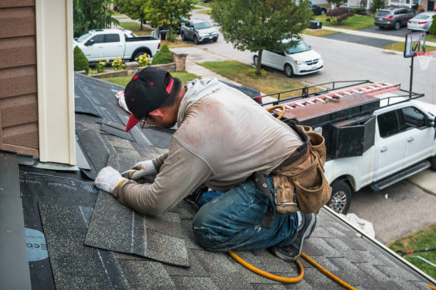 Professional Roofing technician working in Redding Center, CT